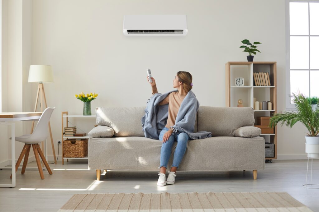 woman using ac unit