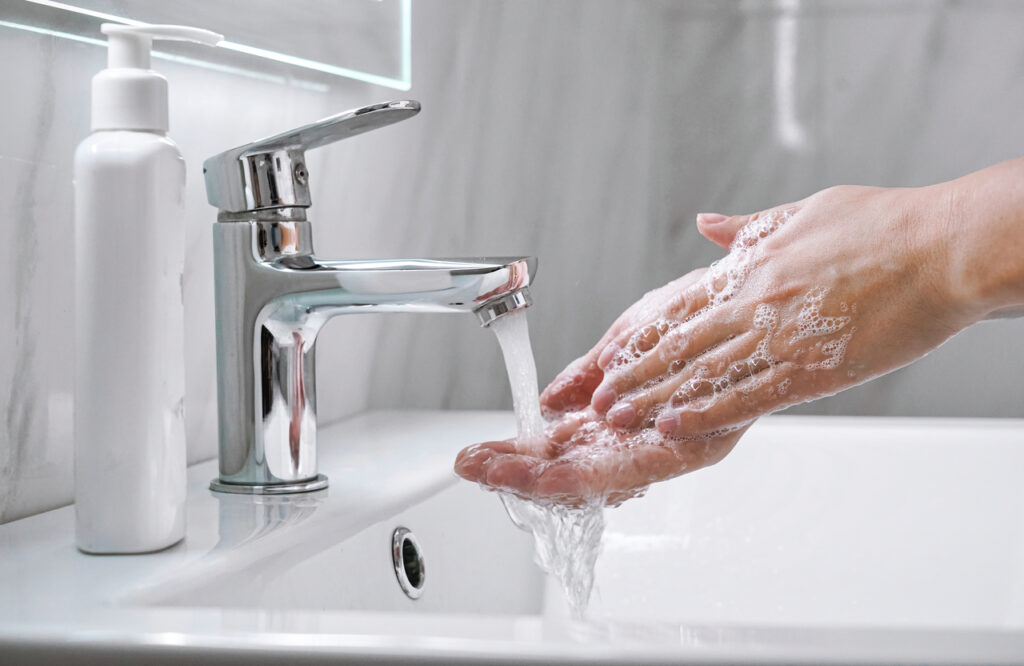 woman washing hands
